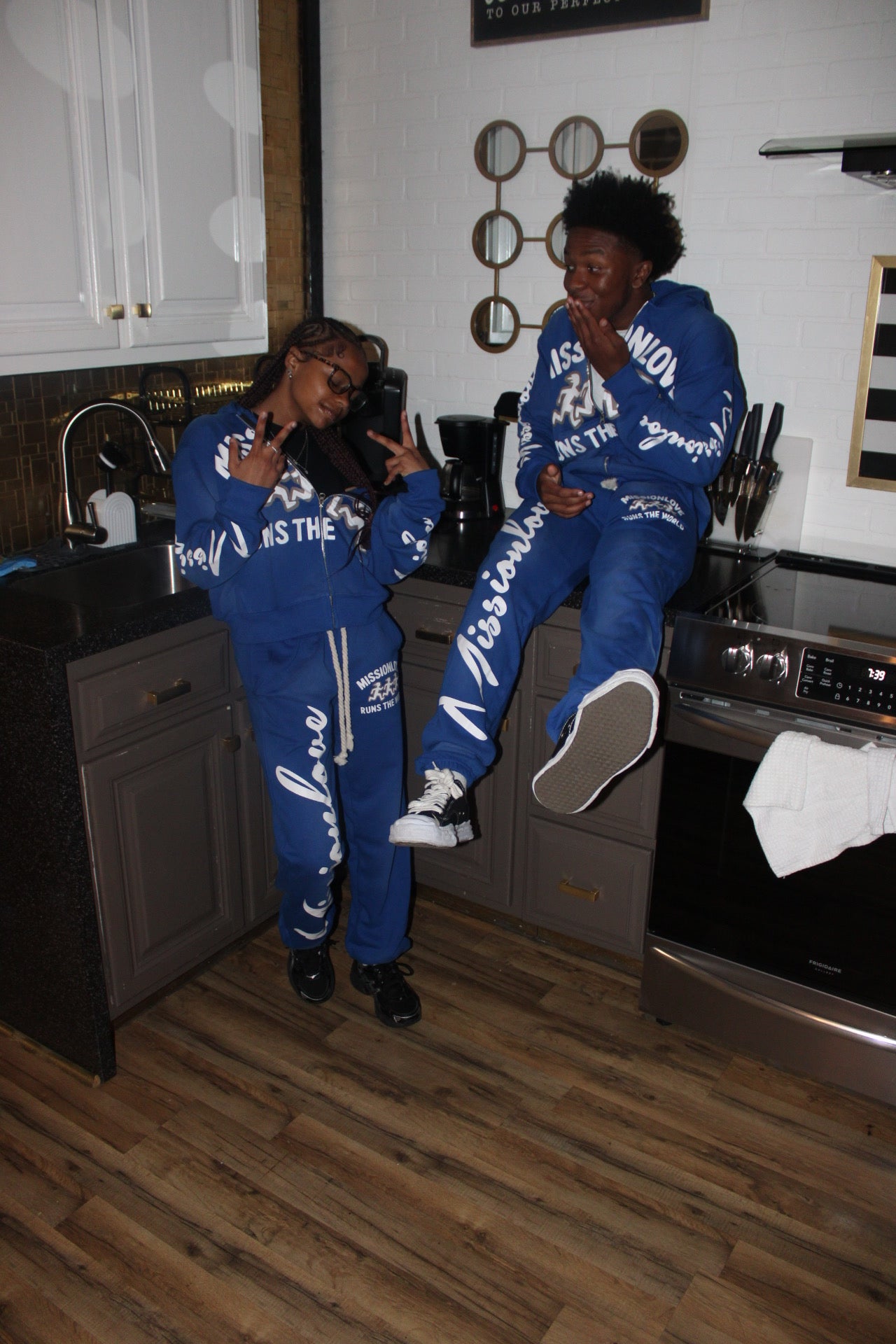 WE RUN THE WORLD *HOODIE*(BLUE)